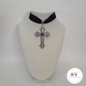 Black choker with cross pendant